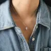 Collar de Acero de Titanio con Colgante de Zircón Grande en Forma de Gota de Agua Transfronterizo Europeo y Americano de Alta Gama para Mujer, Cadena de Clavícula Exquisita Versátil de Lujo Ligero