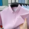 Camisa Oxford 100% Algodão 2026 Nova Moda Camisa Casual Simples e Confortável Cardigã Masculino de Manga Curta