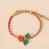 2026 Novo Modelo Pulseira de Flor Rosa Iridescente Ajustável Fashionável Versátil Corda Trançada Multicolorida Corda de Segurança para Pulseira