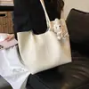 Bolso de mano casual simple para mujer, nuevo modelo 2026, bolso de hombro de moda de gran capacidad para el trabajo, bolso versátil para el antebrazo