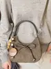 Outono/Inverno 2026 Novo Design Bolsa de Mão/Transversal com Laço Bolsa Melade Tendência Versátil Fashionável Feminina