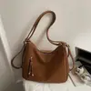 Bolsa Feminina Nova Estilo Coreano Vintage Moda Primavera 2026 Bolsa de Ombro para o Trabalho Bolsa de Mão de Nicho Bolsa Tote Vintage