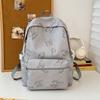 Nova Mochila de Grande Capacidade com Borboleta Moda Casual Versátil para Homens e Mulheres Mochila para Estudantes do Ensino Médio Bolsa para Estudantes de Campus Venda por Atacado