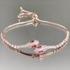 Pulsera con Forma de Flor de Cerezo y Lazo de Circonita Rosa para Mujer Estilo Ins Nicho Lujo Ligero Temperamento Gama Alta Sentido Frío Joyería de Mano para Mejor Amiga Tendencia