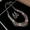 Aretes y collar de dos piezas con colgante de flor y gota de agua incrustados con diamantes, cadena para la clavícula de moda y exquisita, joyería de lujo ligero y de alta gama para mujer
