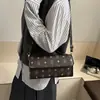 Bolso Pequeño Cuadrado de Moda de Aspecto Elegante para Mujer 2025 Nuevo Retro Color Contrastante Cadena Bolso de Hombro Cruzado para Mujer Changchun