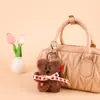 Punto Coreano Dongdaemun Otoño e Invierno Oso de Peluche Colgante de Bolso Lazo Muñeca de Dibujos Animados Muñeca Decorativa Venta al por Mayor