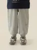Calça jogger esportiva lisa nova de outono 2026 para meninas Wulibu, solta e durável, calça longa casual para crianças, moderna