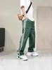 Nuevos pantalones casuales de rayas versátiles de secado rápido para primavera y otoño, pantalones largos rectos holgados de moda para hombres jóvenes, pantalones deportivos