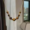 Cadena para Suéter Ajustable con Cuentas de Ojo de Tigre Chapada en Oro Real de 18K Cadena para Clavícula Maillard Diseño de Nicho Collar
