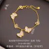 Transmissão ao Vivo Venda Quente Pulseira Borboleta Dourada Brilhante 24K com Diamantes Incrustados e Madrepérola Joia de Mão Feminina de Luxo Leve Estilo Francês Acessórios de Moda Presentes