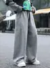 Calça Masculina de Caimento Solto Calça Esportiva para Crianças de Tamanho Médio e Grande 2026 Nova Calça Casual Masculina Estilo Outono Perna Reta Perna Larga