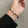 Cristal de Fresa Marca de la Fortuna Cuerda Tejida Pulsera DIY Estilo Ins para Mujer Sentido de Diseño de Nicho Cuerda para la Mano de Novia Pieza de Mano Dulce de la Fortuna