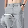 Pantalones casuales de seda helada ligeros de verano para hombre, pantalones rectos holgados de secado rápido, pantalones de vestir versátiles, pantalones largos transpirables elásticos para hombre