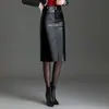 Elegante y versátil falda de piel sintética para mujer, nuevo modelo otoño 2026, de cintura alta, adelgazante, con abertura, de longitud media, falda recta
