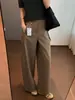 Pantalones retro versátiles de talle alto y pierna ancha Zedaijiai con una caída nítida, cintura elástica en la espalda, bolsillos grandes y un estilo casual favorecedor para el trabajo.