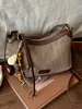 Bolso tejido pequeño exquisito transfronterizo para mujer, nuevo bolso cruzado versátil de moda otoño 2026, bolso popular de hombro único tipo empanada