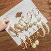 Pendientes de mujer europeos y americanos transfronterizos nuevos con perlas incrustadas, conjunto creativo de pendientes dorados retro franceses, juego de 9 piezas