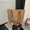 Bolso grande de mujer transfronterizo, nuevo de otoño 2026, versátil, de moda, de un solo hombro, con bloques de color, para ir al trabajo, retro, casual, tipo tote