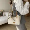 Bolso cubo, versátil y elegante, con una lujosa textura de gamuza, un bolso cruzado de moda, un nuevo bolso de hombro de nicho y moderno para mujer, 2026