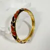 Yongge Jewelry Pulsera de Esmalte Transfronteriza Europea y Americana para Mujer Moderna Colorida Geométrica Rayada de Puntos Filigrana con Borde Dorado Accesorio de Mano