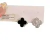 Pendientes de Aleación de Cobre con Circonita Sintética Clásico Doble Cara Moda Simple Francés Entrada Lujo Flor de Cuatro Hojas Hebilla de Oreja Nuevo para Mujeres