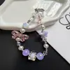 Colgante de cadena para teléfono con lazo de estrella plisado estilo Ins, llavero de alta gama y accesorio para bolso al por mayor