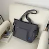 Colección de otoño 2026 transfronteriza: bolso de hombro versátil de color liso, bolso tote de gran capacidad, adecuado para estudiantes y personas que van al trabajo, se puede llevar cruzado