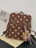 Mochila Escolar Transfronteiriça Outono 2026 para Mulheres, Versão Coreana, Moda Vintage Versátil Mochila de Bolinhas