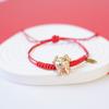 Yiwu pequeña mercancía Año Nuevo pulsera de cuerda roja joyería femenina al por mayor temperamento artístico linda pulsera de cerámica roja pulsera