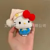 Llavero de peluche Hello Kitty, muñeco de sombrero de paja Hello Kitty de cuero negro, amuleto popular para bolsa de dibujos animados
