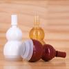 Botella de plástico de doble calabaza de 10 ml Botella de burbujas de ácido hialurónico marrón Botella pequeña portátil para esencia en stock al por mayor