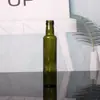 Botella de vidrio para aceite de oliva verde oscuro al por mayor, botella para aceite de camelia, botella pequeña comestible para aceite de sésamo, botella vacía, botella para aceite de uso doméstico para cocina