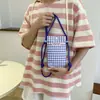 Bolso pequeño cruzado transfronterizo 2025 nuevo, bolso de compras para teléfono a cuadros fresco estilo coreano, bolso de hombro versátil dulce y genial para niñas