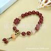 Pulsera de cinabrio rojo al por mayor con alto contenido de arena de oro púrpura de 8 m de cuentas redondas con colgante pulsera de la paz golondrina bestia valiente viva