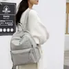 Mochila Versátil de Tela de Nylon para Viajes de Moda al Aire Libre Transfronteriza Ligera Nuevo Estilo Gran Capacidad Mochila Pequeña de Moda Bolso de Doble Hombro