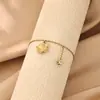 Tobillera con Colgante de Flor Cadena de Acero Inoxidable Chapada en Oro de 18 Quilates Joyería de Circonita Estilo Festivo de Venta Caliente Transfronteriza Europea y Americana Joyería para el Pie