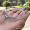 Suministro de transmisión en vivo calcedonia de hielo mitad montaña mitad agua montaña lejana Daimei pulsera femenina ágata cian aceitoso barra redonda delgada venta al por mayor