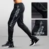 Calça Esportiva Masculina Futebol Treinamento Profissional Corrida Fitness Calça Longa Primavera e Outono Secagem Rápida Esportes Estudantes Coleta de Perna Atletismo