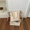 2026 Novo Estilo Bolsa Saco de Malha de Diamante Preto Bolsa Pequena Feminina Estilo Fragrância Bolsa de Ombro Único Transversal Versátil para o Trabalho