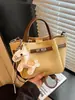 Bolso de Oficina Súper Popular para Mujer 2026 Nuevo Modelo Bolso de Hombro Cruzado para Viajes con un Toque de Lujo, Bolso Cubo Estilo Cesta