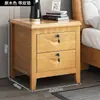 Mesa de cabeceira de madeira maciça estilo chinês instalação cabeceira quarto casa simples moderno com trava armário de armazenamento para quarto de aluguel armazenamento