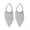 Fabricantes de origem atacado brincos de borla de strass de personalidade em forma de gota flash brincos europeus e americanos senso de luxo leve de alta qualidade para mulheres