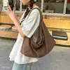 Bolsa tote para mujer 2026, nueva bolsa de moda versátil vintage, material suave, gran capacidad, bolso de hombro casual, bolso de axila para ir al trabajo