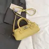 Bolsa macia tipo sacola com padrão de lichia texturizado para mulheres, nova moda 2026, bolsa tote Boston, bolsa de ombro e bolsa transversal