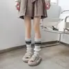 Zapatos y calcetines: Calcetines apilados de color liso para mujer, otoño e invierno, estilo universitario, calentadores de piernas de lana tejidos de moda, calcetines cálidos para protección de piernas