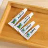 Hotel Hotel Artículos de tocador desechables Pasta de dientes con aguja de dos lados Portátil de viaje pequeño Suministros de hotel Consumibles