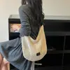 Bolso tejido hueco de moda para mujer, nuevo modelo 2026, bolso de playa para vacaciones junto al mar, bolso de hombro y cruzado de gran capacidad
