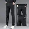 Novas Calças Masculinas Casuais de Corte Reto Soltas com Stretch para Outono/Inverno 2026, Calças de Trabalho de Espessura Média, Calças Sociais Masculinas