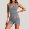 Conjunto de fitness europeo y americano transfronterizo, conjunto de dos piezas de top sin mangas de cuello halter de color liso y shorts ajustados, atuendo deportivo de running y yoga para mujer